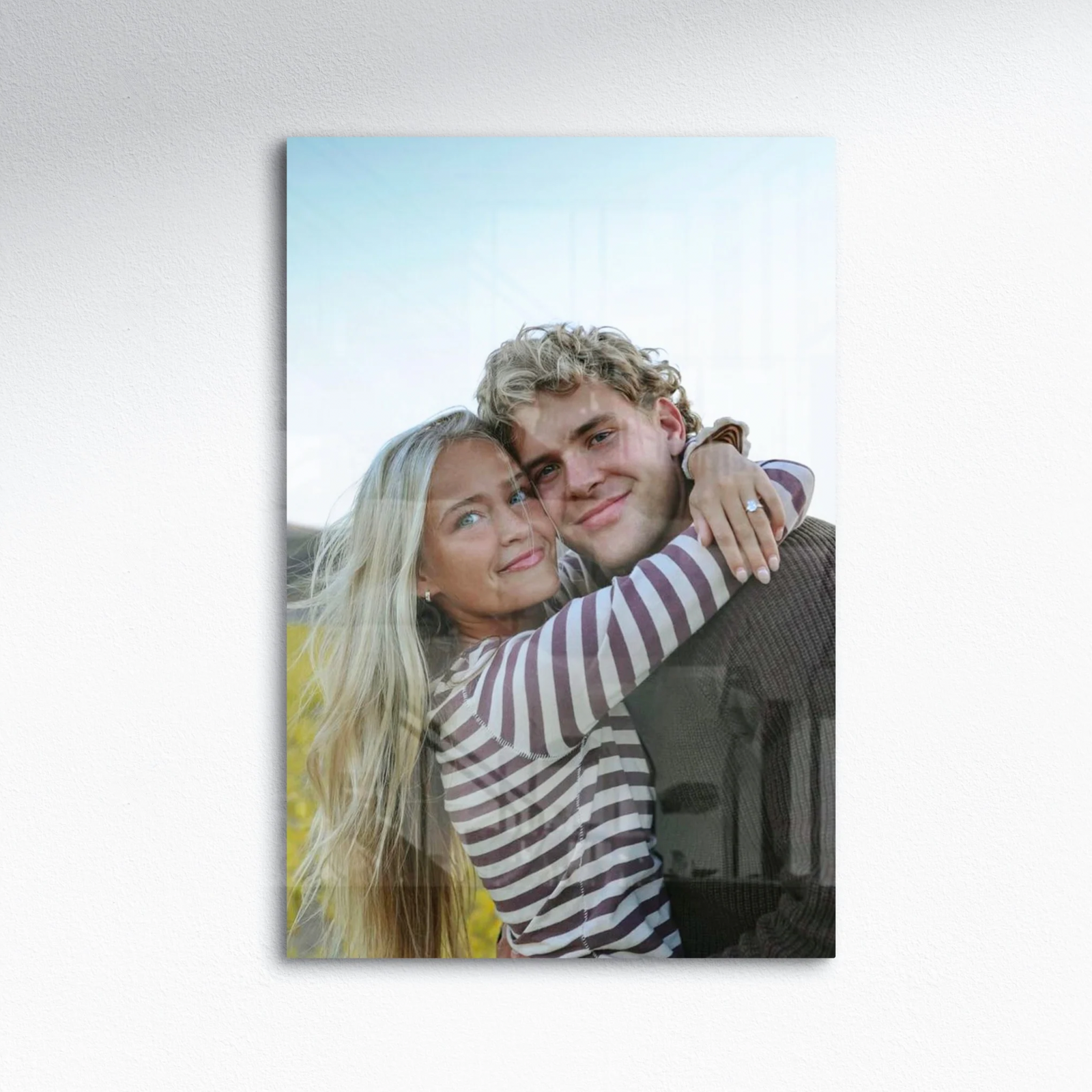 A couple photographed together, printed on metal